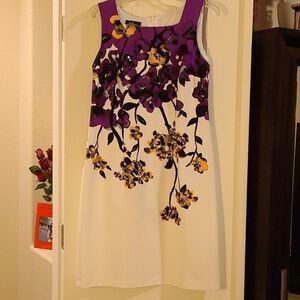 AGB
- Cream and purple dress